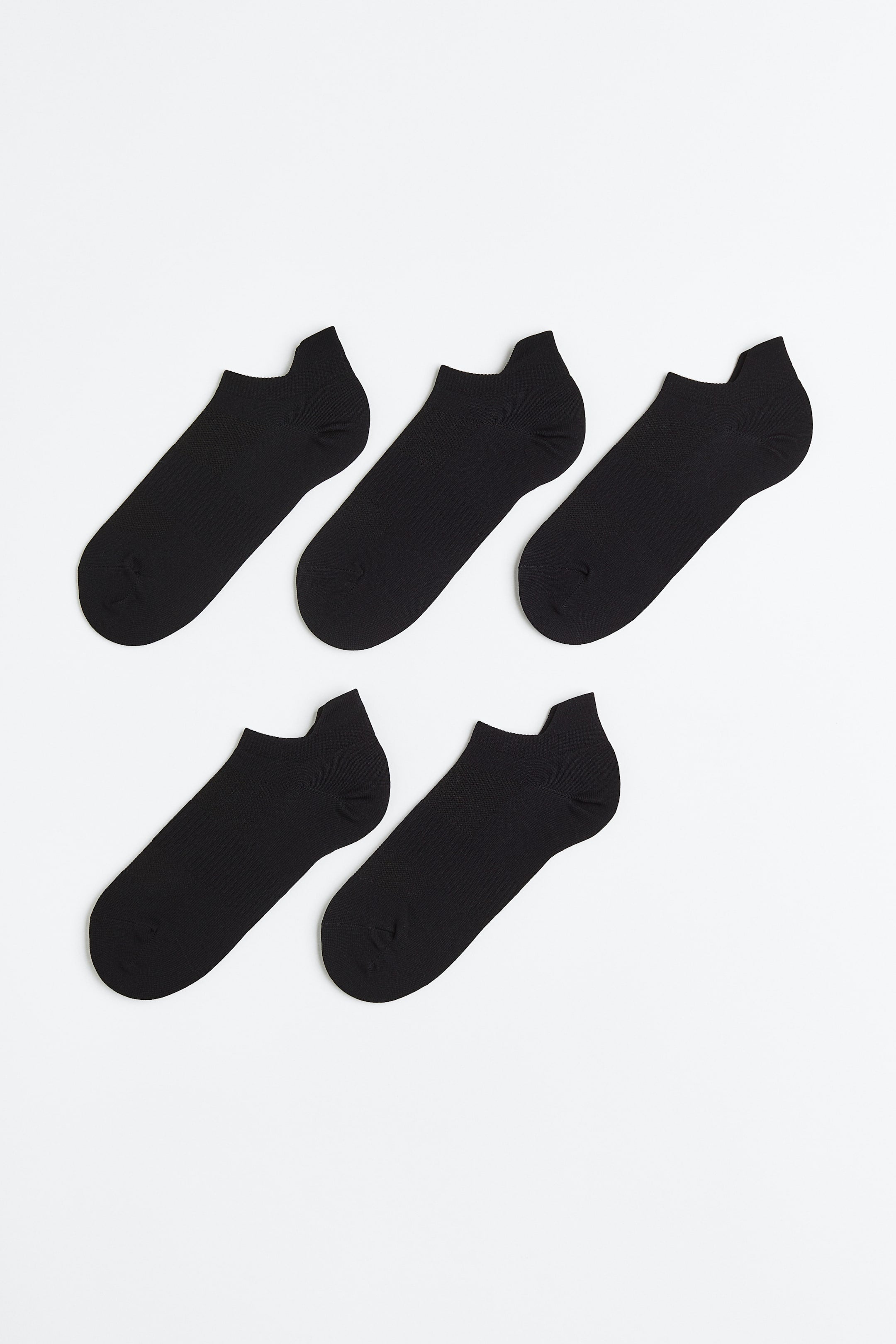 Five black low-cut socks.